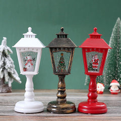 Three Christmas lantern lamps side by side