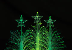 Green fibre optic tree tops with stars