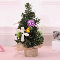 Mini Christmas tree with purple bauble and linen base