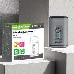 Grey mini air pump next to its box