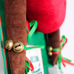 Close-up of the jingle bells on a brown antler