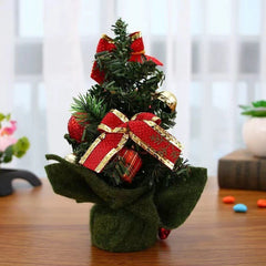 Mini Christmas tree with red bows and green base