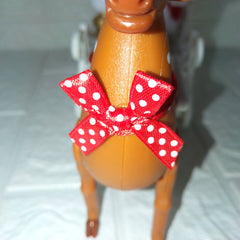 Close-up of the reindeer with a red polka-dot bow
