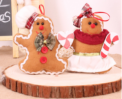 Gingerbread boy and girl Christmas hangers together