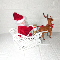 Santa sleigh with reindeer on a table