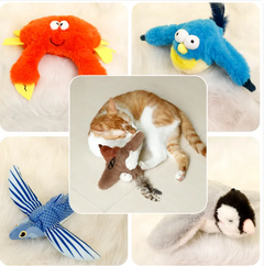Plush crab, bird, flying fish and penguin toys with a cat