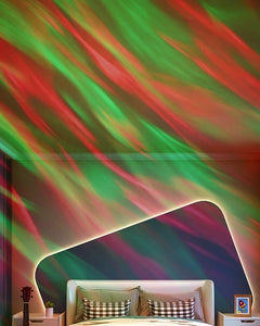 Red and green aurora-style light projected across a bedroom ceiling and wall
