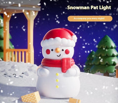 Snowman night light in a snowy Christmas scene