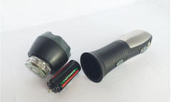 Flashlight unscrewed showing the batteries