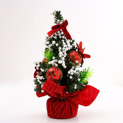 Mini Christmas tree with red baubles and red base