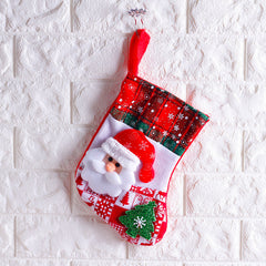 Santa mini stocking hanging on a white wall