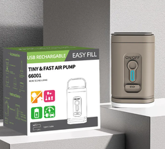Champagne mini air pump next to its box