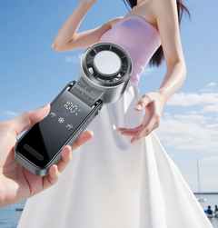 Handheld fan in use outdoors