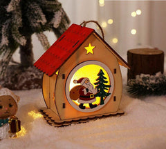 Red-roof wooden house with Santa and his sack